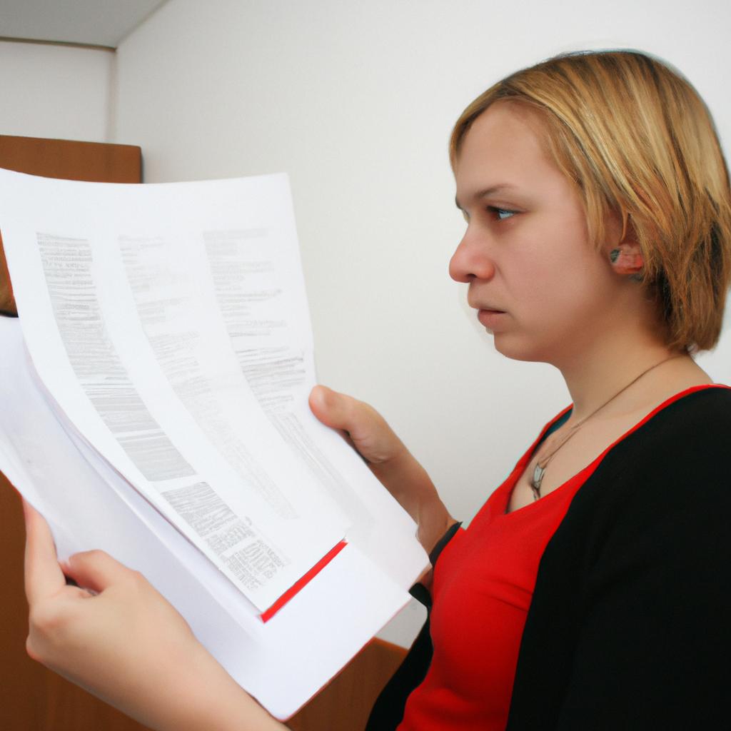 Person reading loan documents attentively